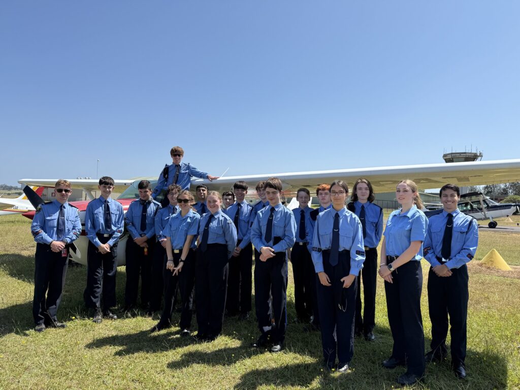 Cadets standing in front of aircraft